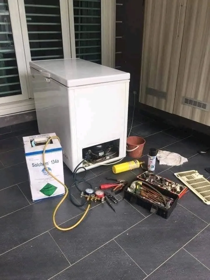 Commercial freezer unit with tools for repair service